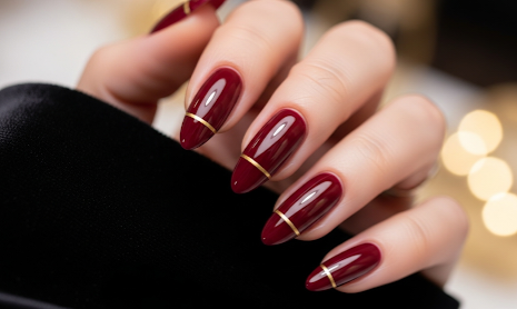 Burgundy Nails with Gold Line